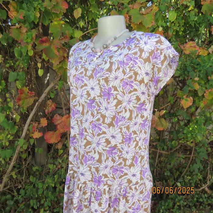 Vintage drop waist stretch polyester dress in tan with white-lilac flowers. Size 38