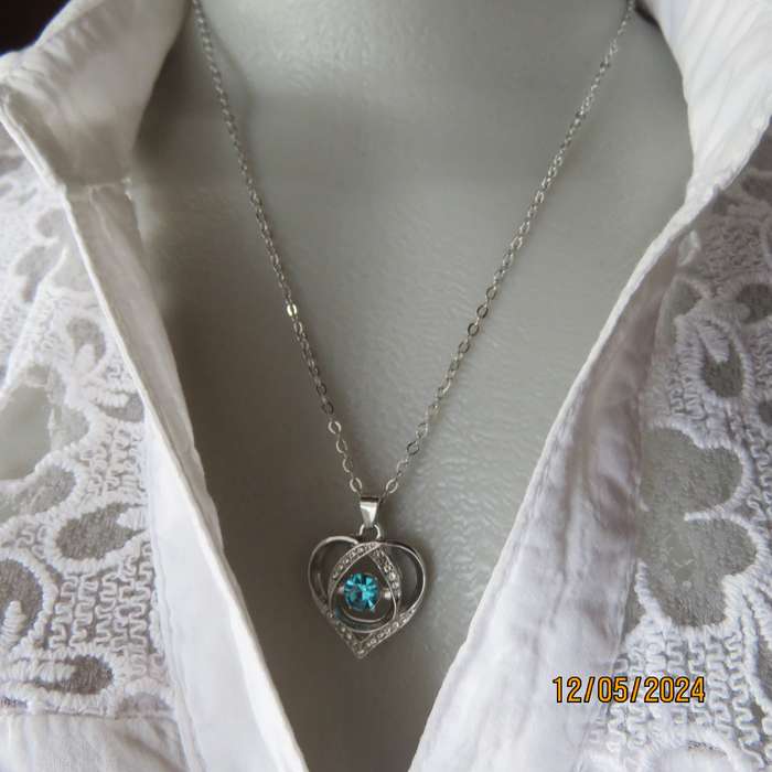 Dainty heart pendant with blue stone and faux diamonds. Silver chain. New item.