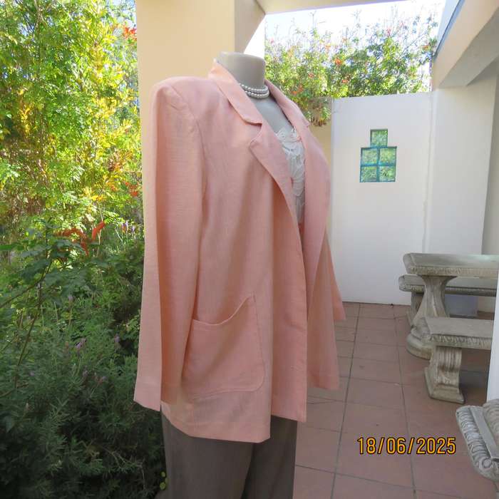Boutique made light apricot woven textured polycotton long sleeve jacket. Size 42.