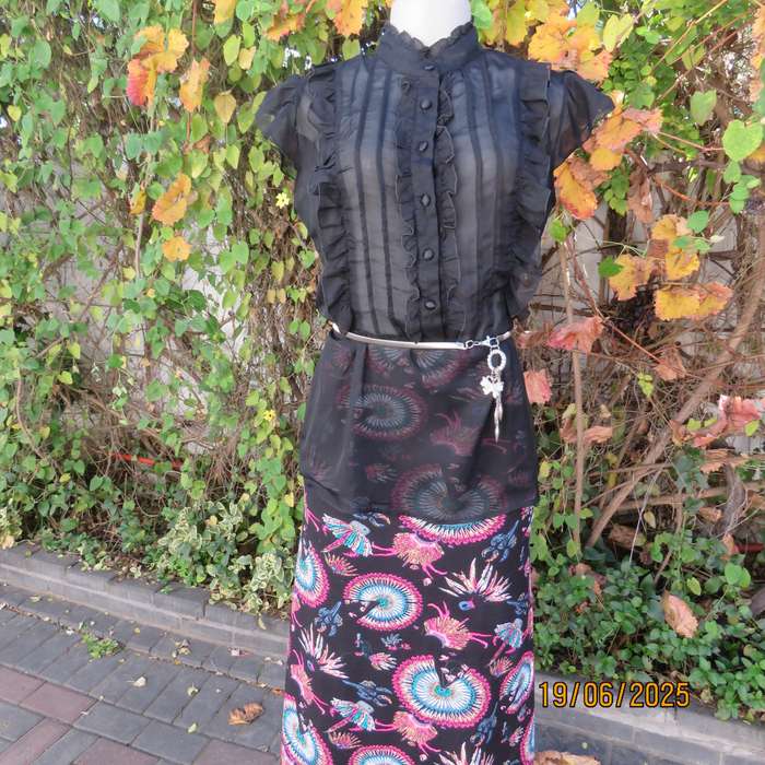 NOSTALGIA sheer black polyester peplum size 37 top. Halfway button down.