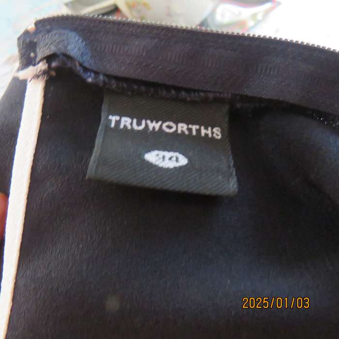 Elegant dark navy empire style sleeveless TRUWORTHS long top. White edging. Back zip, Size 34.As new