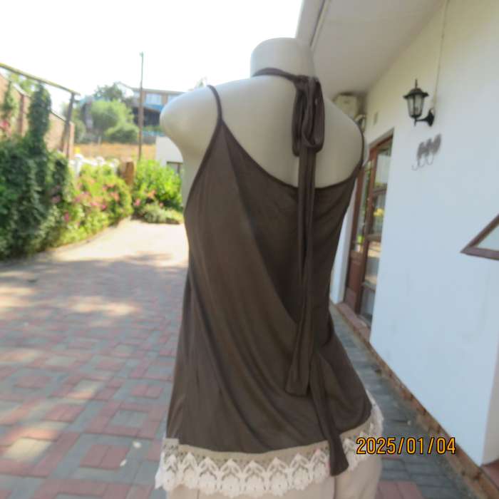 RED MOON uniquely styled brown strappy-halter neck top. Cream cotton frill all around. Size 38-40.