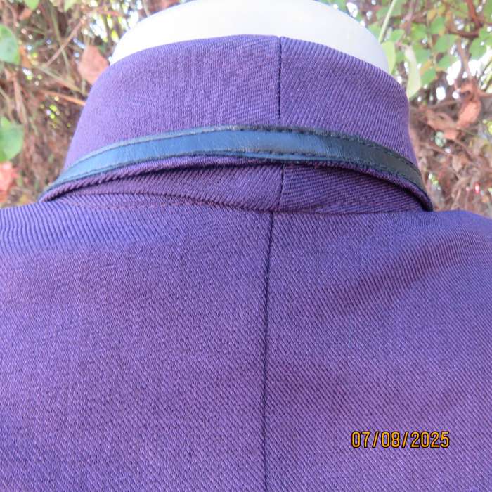 Purple tailored long sleeve jacket with shawl collar and 3 button closure. Size 36