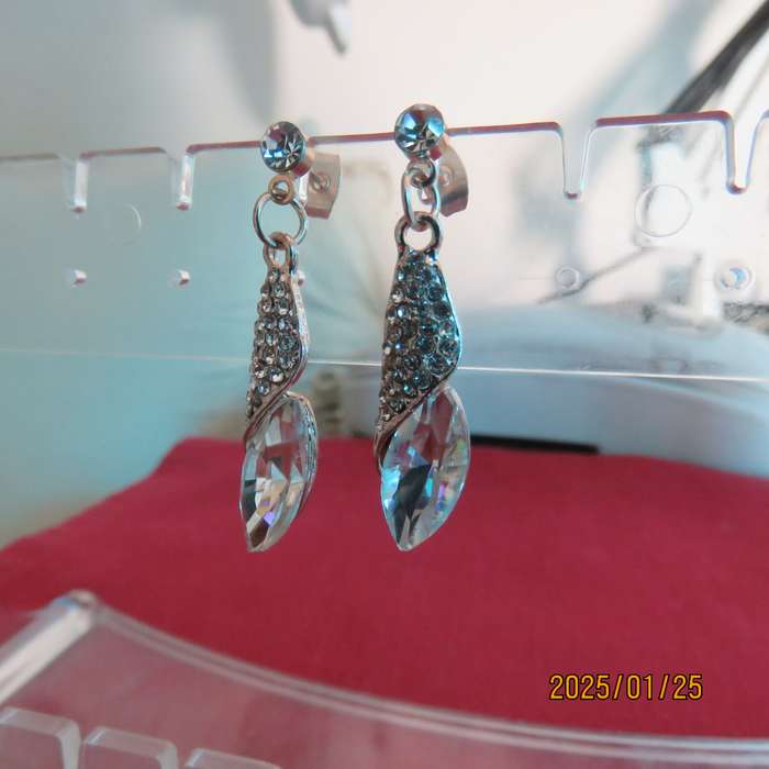 Pair of dainty golden earrings with faux crystal stones and tiny simulated diamonds. New item.