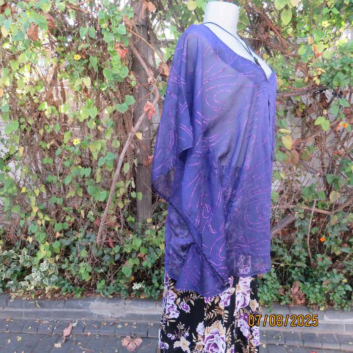 Boutique made sheer purple halfmoon top with glimmer twirls. Pleat on front. Size 40-44
