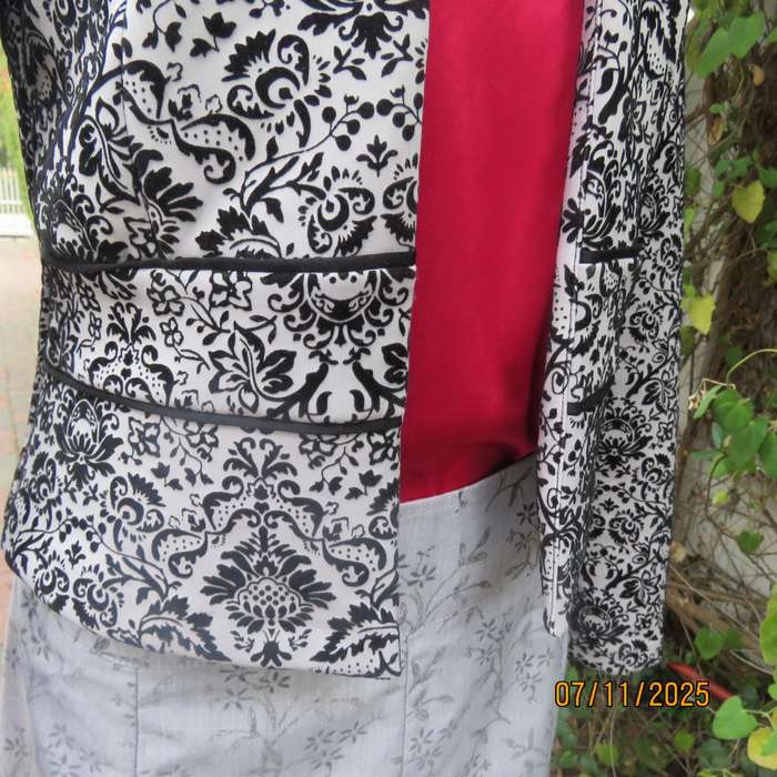 Silver grey stretch polyester long sleeve open elegant jacket.Black velvet baroque embossed. Size 32
