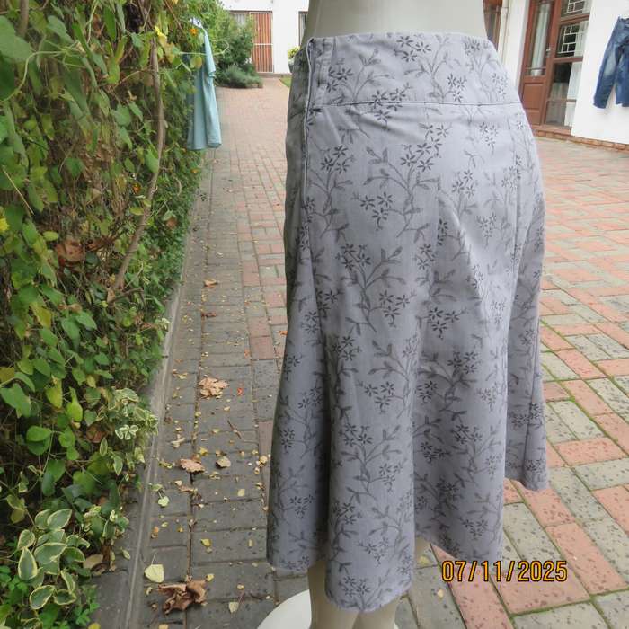 EXACT silver grey A Line paneled skirt with darker grey tiny flowers. Size 38.