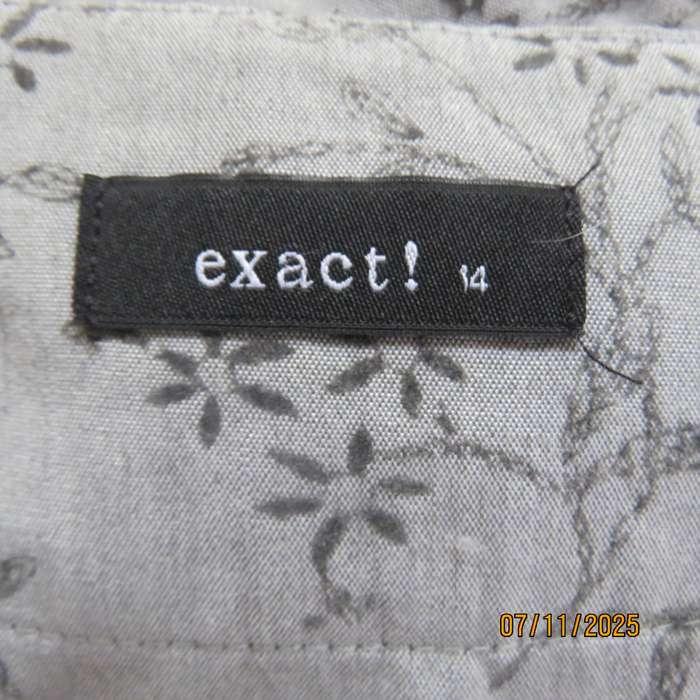 EXACT silver grey A Line paneled skirt with darker grey tiny flowers. Size 38.