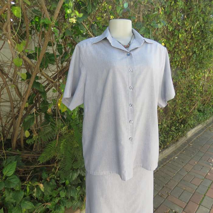Navy-white striped 2 pc pencil skirt-short sleeve top .Size 38.