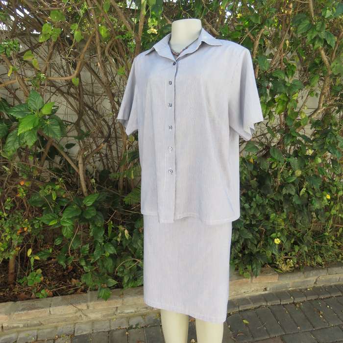 Navy-white striped 2 pc pencil skirt-short sleeve top .Size 38.