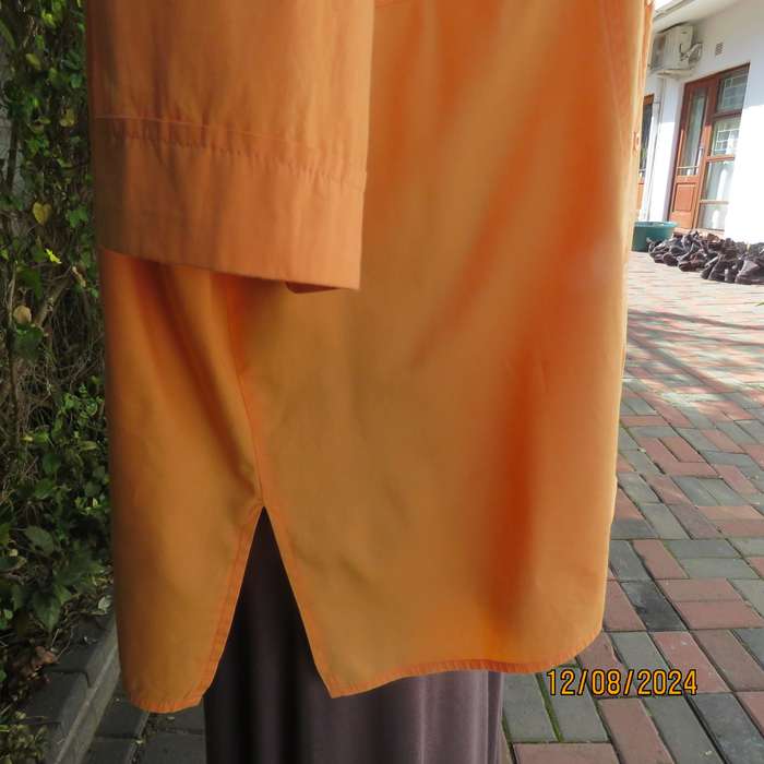 Easy to wear papaya colour button down top with gathered empire front. Size 50by DONATELLA. As new