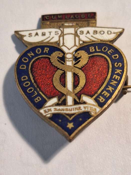 Vintage numbered blood donor badge