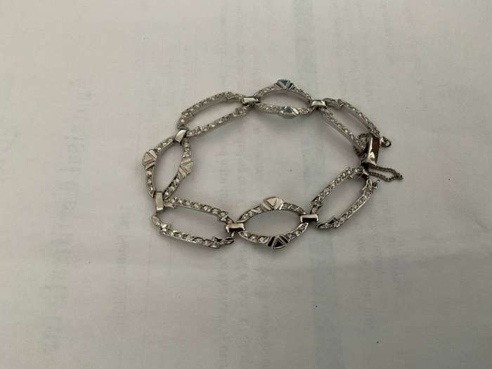 An outstanding 18 ct gold and  108 diamond oval and rectangular link bracelet.