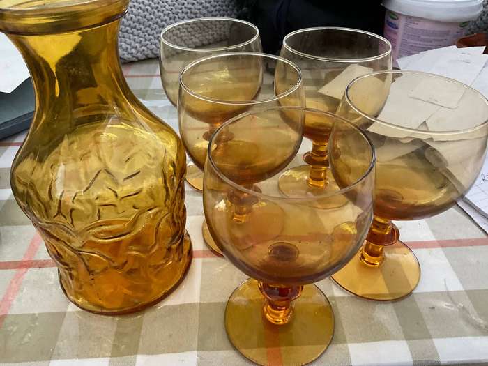 Vintage amber coloured  carafe with 5 matching red wine glasses