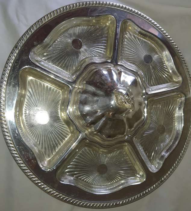 A VINTAGE SILVER PLATED LAZY SUZAN WITH GLASS INSERTS