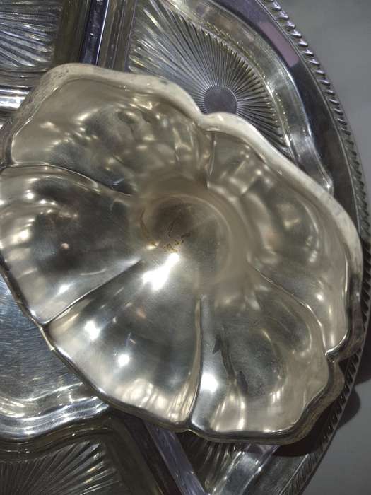 A VINTAGE SILVER PLATED LAZY SUZAN WITH GLASS INSERTS