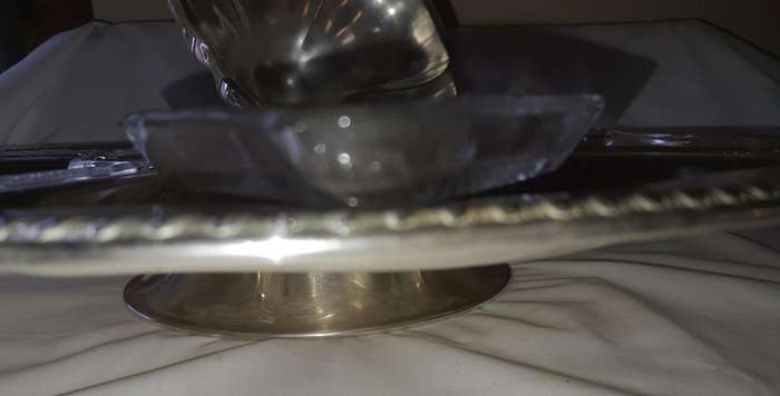 A VINTAGE SILVER PLATED LAZY SUZAN WITH GLASS INSERTS