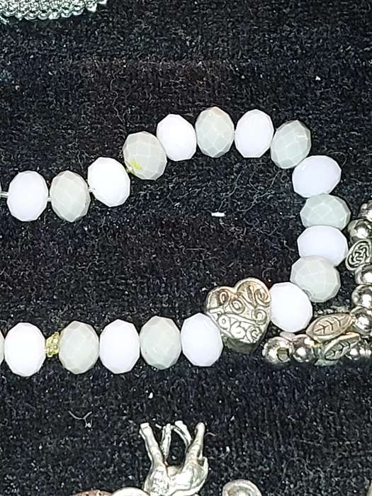 A COLLECTION OF VINTAGE COSTUME BRACELETS AND BANGLES