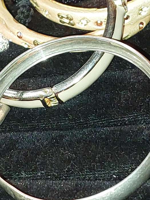 A COLLECTION OF VINTAGE COSTUME BRACELETS AND BANGLES