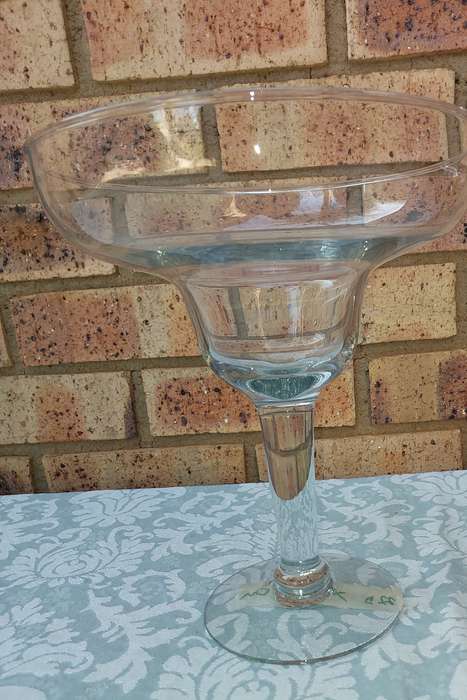 A 26 CENTIMETER TALL ICE CREAM SERVING JAR OR A COCKTAIL FLUTE