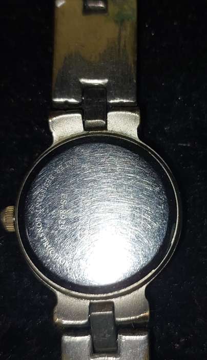 TWO VINTAGE FOSSIL WATCHES SOLD AS IS NOT TESTED.