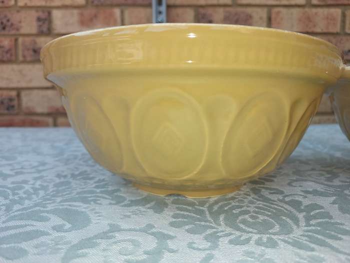 A PAIR TAN CERAMIC SERVING BOWLS