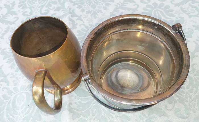 A SILVER-PLATED ICE BUCKET AND A SILVER PLATED ON COPPER PINT BEER MUG