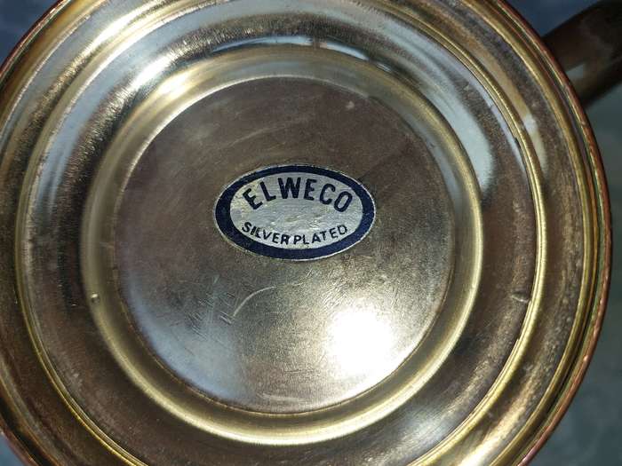 A SILVER-PLATED ICE BUCKET AND A SILVER PLATED ON COPPER PINT BEER MUG
