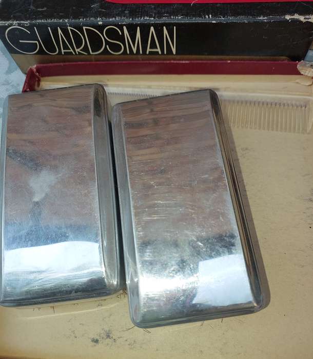 A LEATHER WALLETS AND A SET OF GROOMING BRUSHES