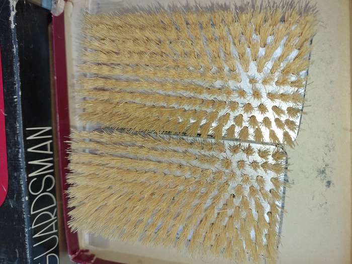 A LEATHER WALLETS AND A SET OF GROOMING BRUSHES