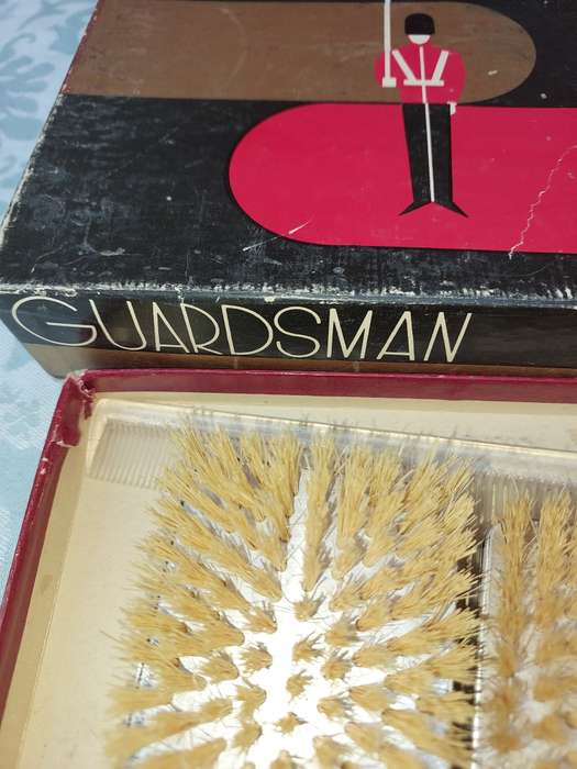 A LEATHER WALLETS AND A SET OF GROOMING BRUSHES