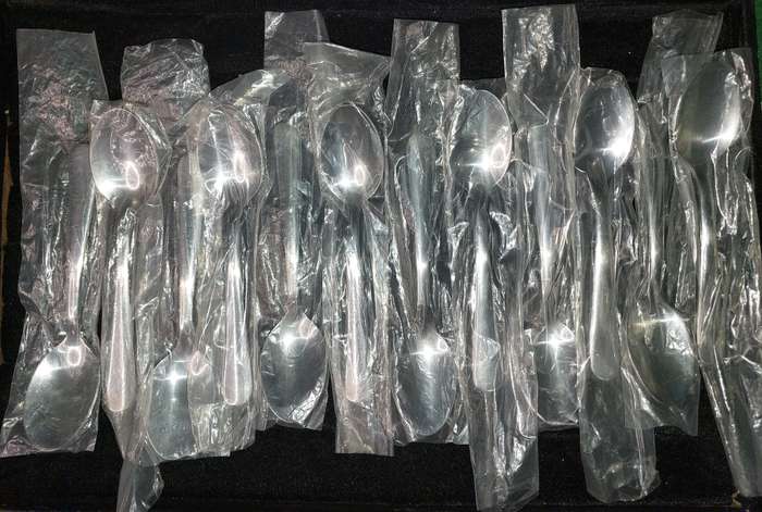 A COLLECTION OF 12 STAINLESS STEEL TEASPOONS VIRTUALLY BRAND NEW