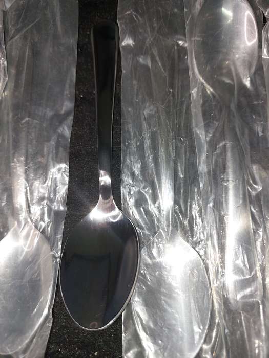 A COLLECTION OF 12 STAINLESS STEEL TEASPOONS VIRTUALLY BRAND NEW