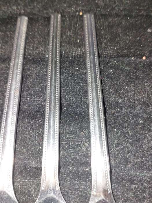 A SET OF 7 STAINLESS STEEL BELLERINA TWIST CAKE FORKS