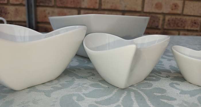 A WHITE STACK MAXWELL AND WILLIAM ART DECOR CONDIMENTS SET