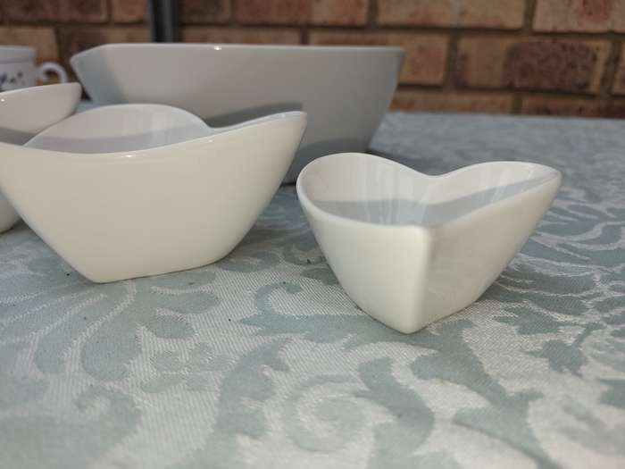 A WHITE STACK MAXWELL AND WILLIAM ART DECOR CONDIMENTS SET