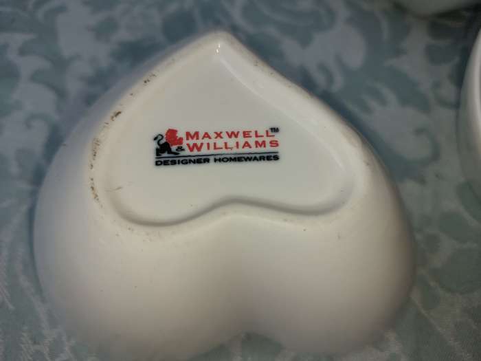 A WHITE STACK MAXWELL AND WILLIAM ART DECOR CONDIMENTS SET