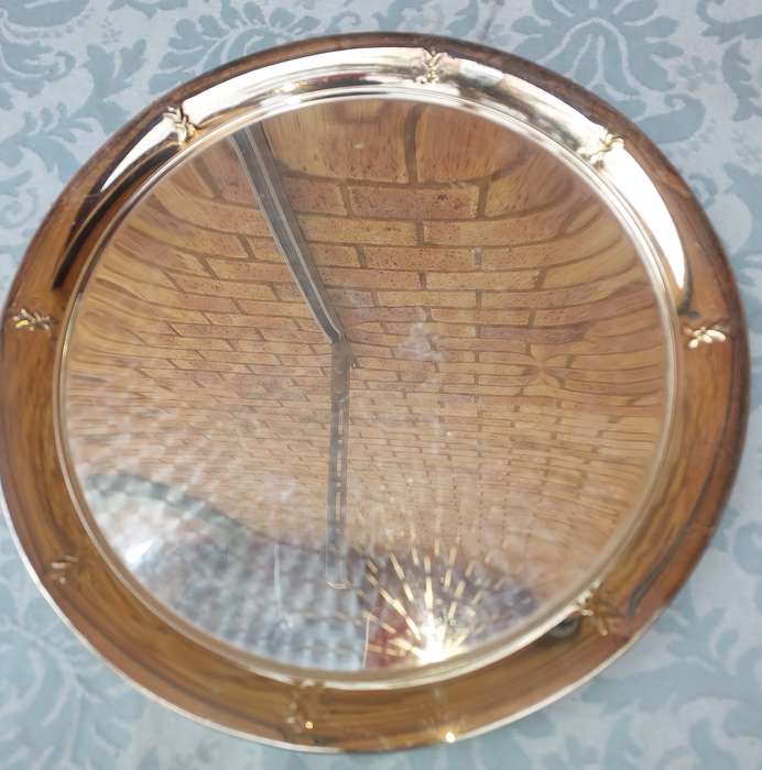 A STAINLESS STEEL SERVING TRAY SOLD A