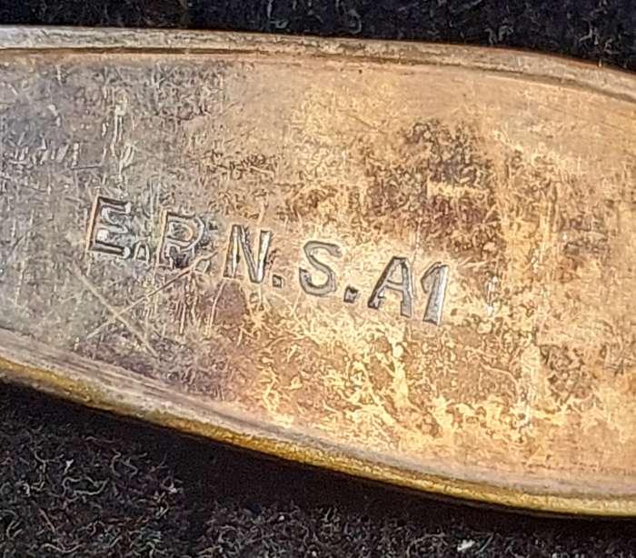 AN ANTIQUE COLLECTION EPNS SPOONS SOLD AS IS