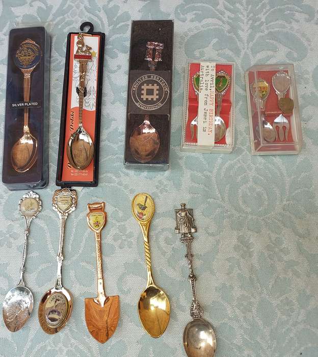 A COLLECTION OF MEMORABILIA SPOONS