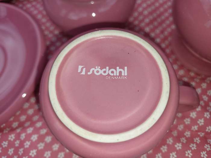 AN 11 PIECE PINK COFFEE CUP AND SAUCER  SET MADE IN DENMARK