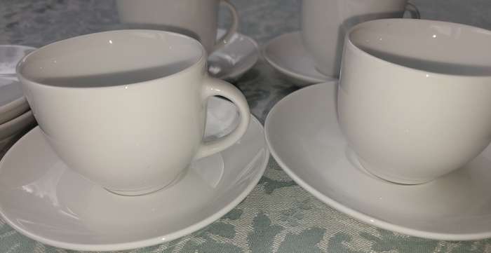 A COLLECTION OF 4 COFFEE CUPS AND SIX SAUCERS BY BOARDMANS