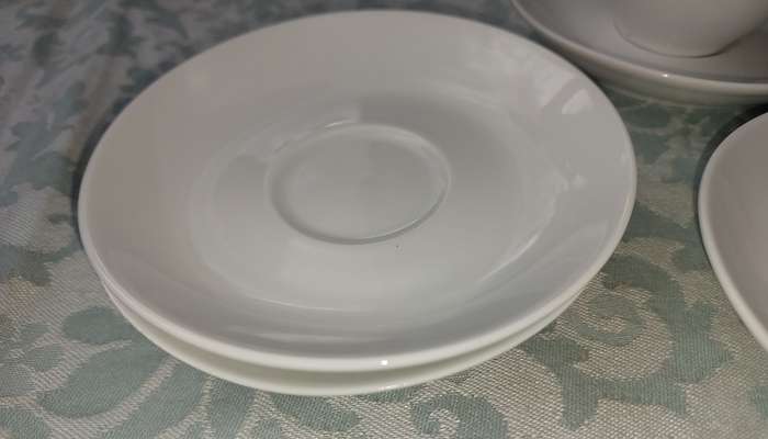 A COLLECTION OF 4 COFFEE CUPS AND SIX SAUCERS BY BOARDMANS