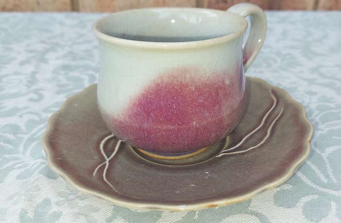 A VINTAGE LASLO FOR MICASA JAPAN CUP AND SAUCER SOLD AS IS