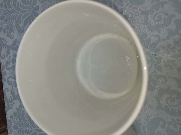 TWO CERAMIC POTS AND A GLASS FLOWER POT SOLD AS IS