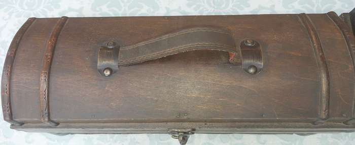 TWO ORNATE WOODEN WINE CADDYS WITH LEATHER HANDLES