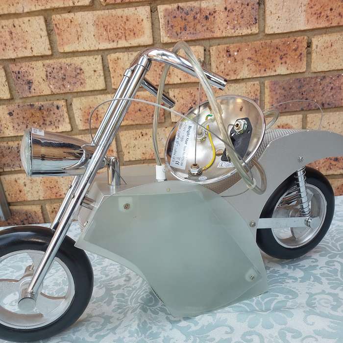 AN ART DECOR MOTOR CYCLE CHANDELIER