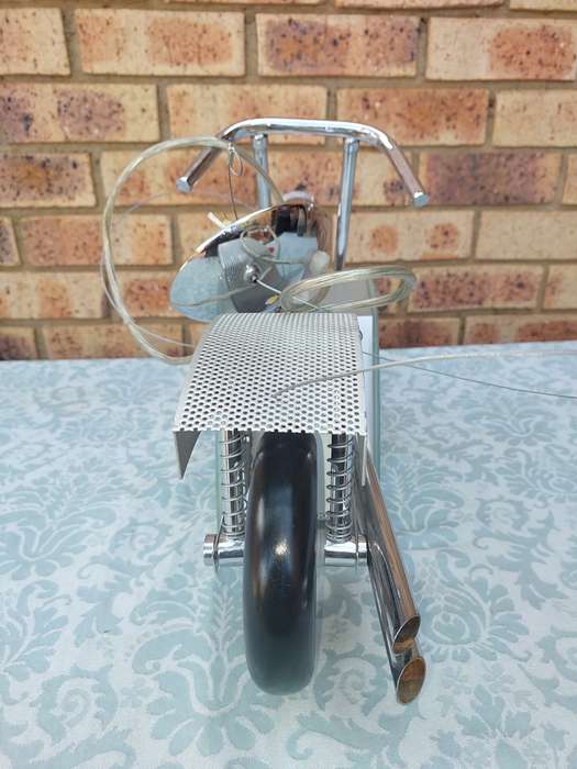 AN ART DECOR MOTOR CYCLE CHANDELIER