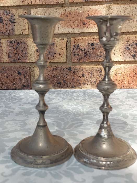 TWO VINTAGE CANDLE HOLDERS SOLD AS IS