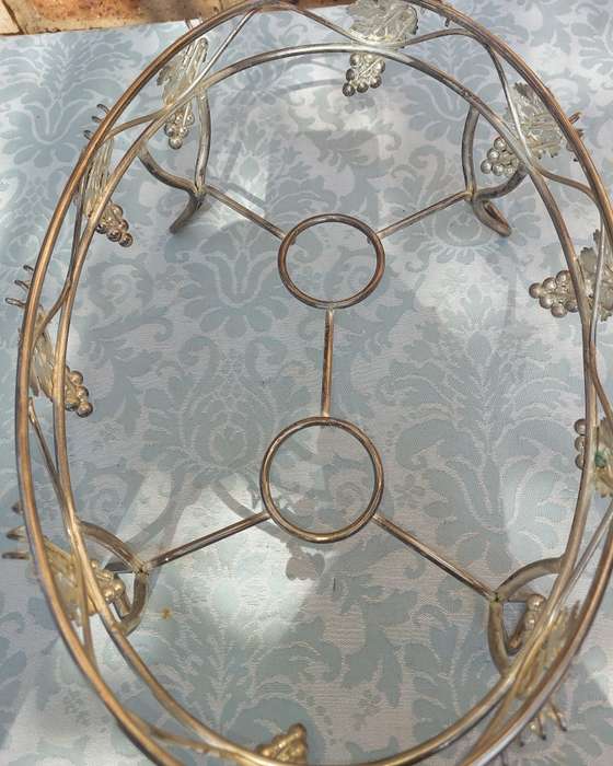 A VINTAGE GRAPEVINE CASSEROLE WARMER STAND